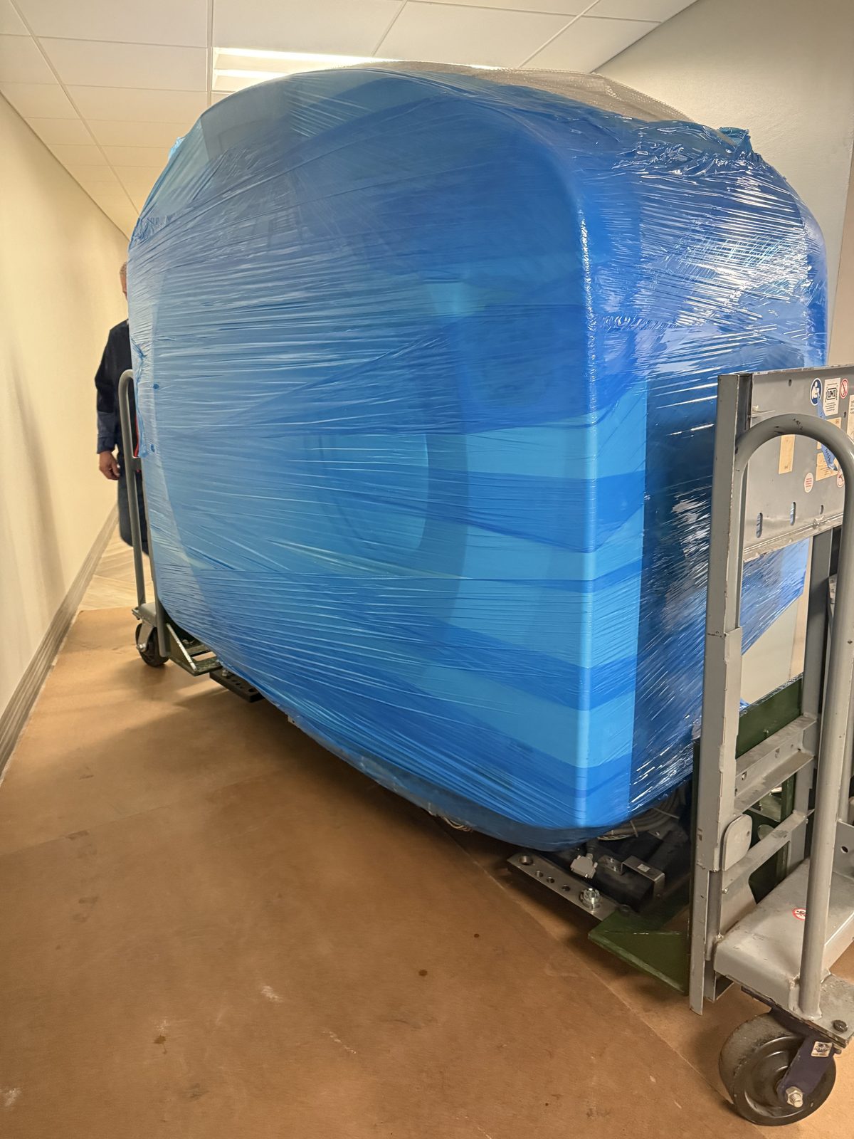 CT gantry shrink-wrapped and ready to move