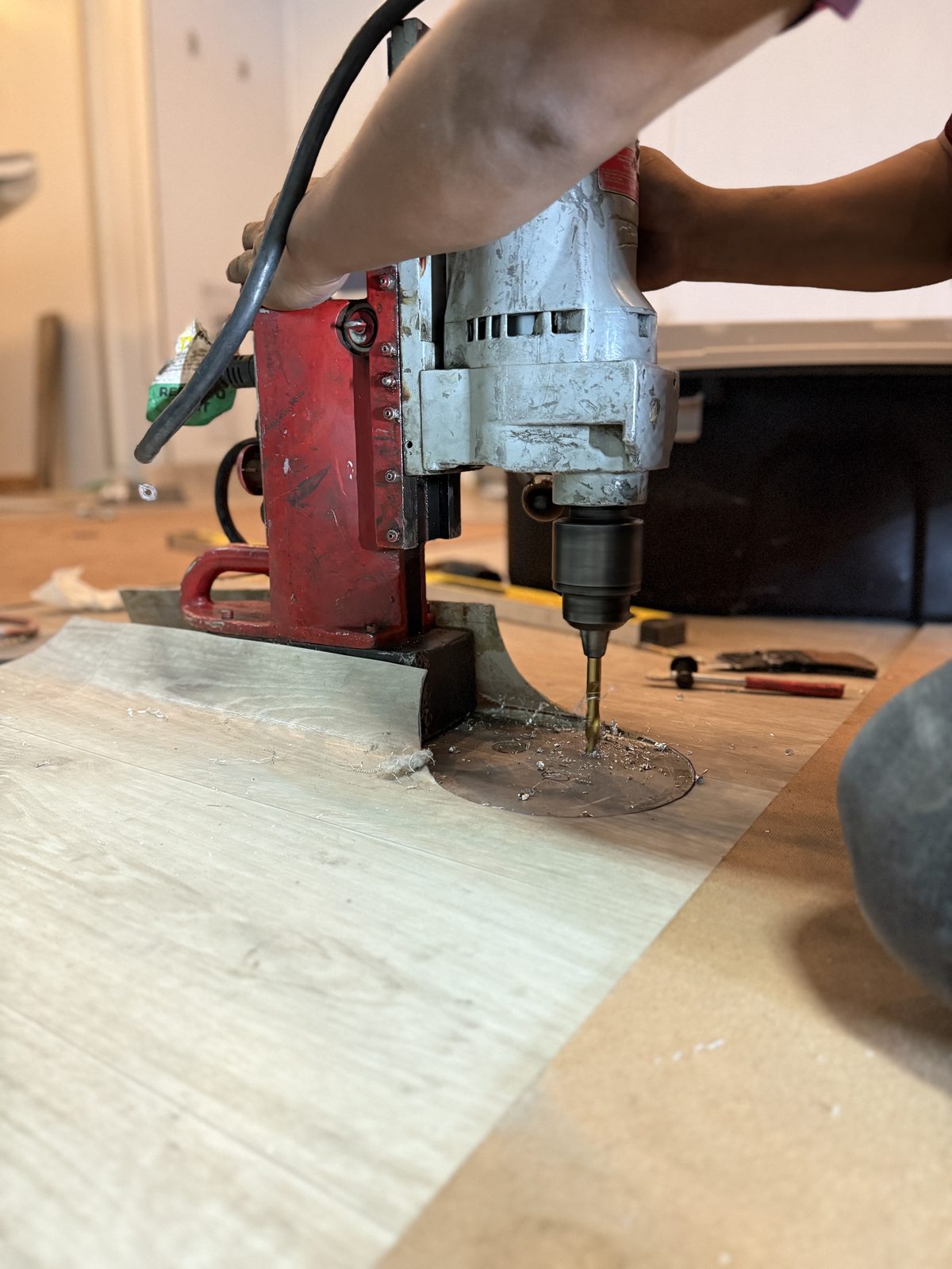 Magnetic drill fabricating an equipment mount plate