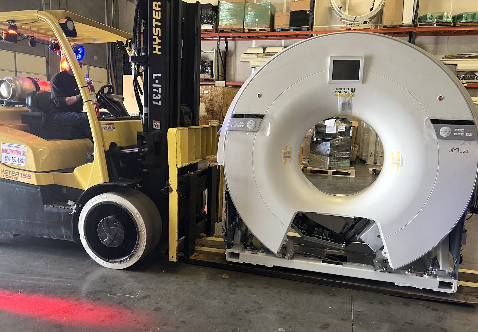 United Imaging uMI 550 CT gantry moved by forklift